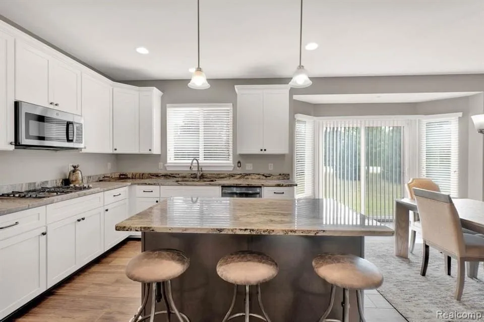 a kitchen with a large island