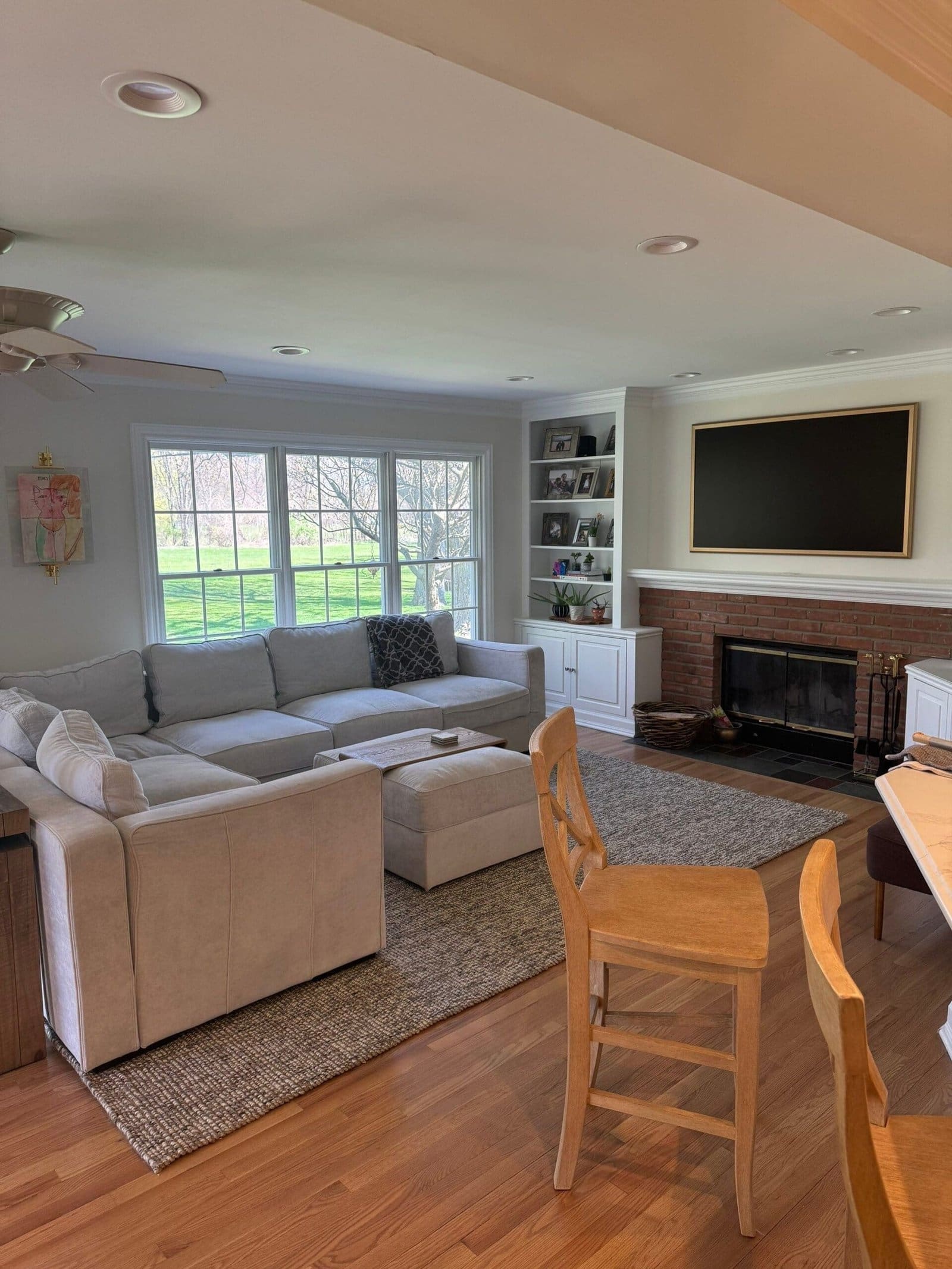 a living room with a couch and a fireplace